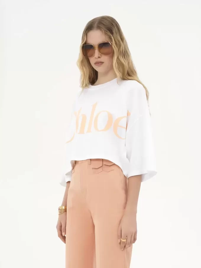 Oversized-T-Shirt mit kurzem Logo aus Baumwolljersey Oversized-T-Shirt mit kurzem Logo aus Baumwolljersey