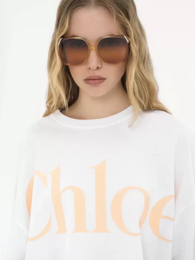 Oversized-T-Shirt mit kurzem Logo aus Baumwolljersey Oversized-T-Shirt mit kurzem Logo aus Baumwolljersey