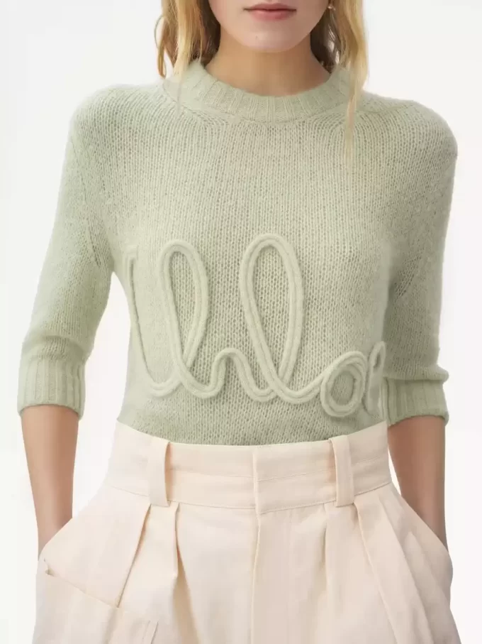 Pullover mit Logo und Ellenbogenärmeln aus Alpakawolle und Seidenstrick Pullover mit Logo und Ellenbogenärmeln aus Alpakawolle und Seidenstrick