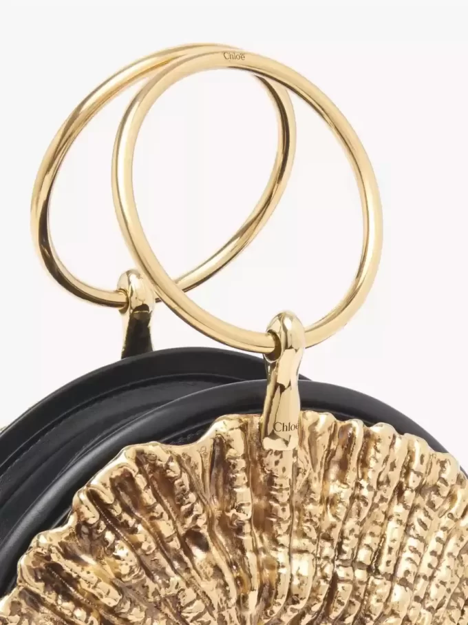 Sea Treasures Shell Clutch mit Reißverschluss aus weichem Leder und Metall Sea Treasures Shell Clutch mit Reißverschluss aus weichem Leder und Metall
