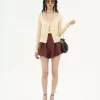 Taillierte Strickjacke mit U-Ausschnitt aus superfeinem Wollstrick Taillierte Strickjacke mit U-Ausschnitt aus superfeinem Wollstrick