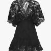 Tailliertes Rüschentop aus Spitze Tailliertes Rüschentop aus Spitze