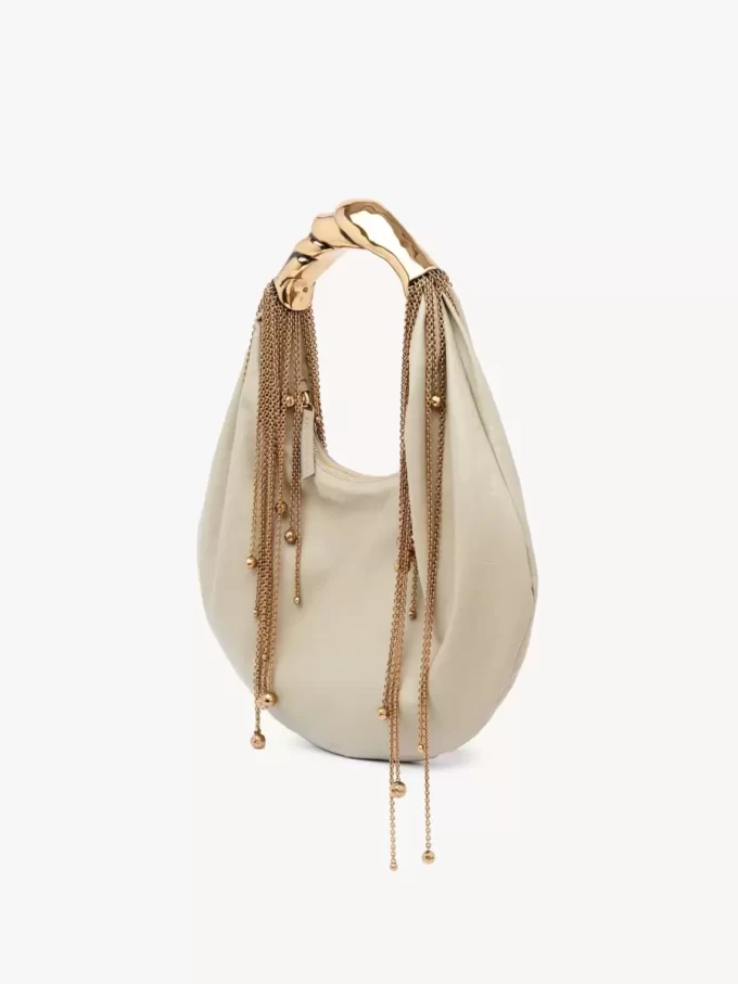 Twisted Shell Hobo-Tasche aus glänzendem Leder Twisted Shell Hobo-Tasche aus glänzendem Leder