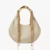 Twisted Shell Hobo-Tasche aus glänzendem Leder Twisted Shell Hobo-Tasche aus glänzendem Leder