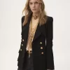Zweireihige Tailored-Jacke aus Wollbouclette Zweireihige Tailored-Jacke aus Wollbouclette
