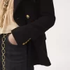 Zweireihige Tailored-Jacke aus Wollbouclette Zweireihige Tailored-Jacke aus Wollbouclette